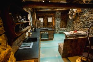 an overhead view of a kitchen in a cabin at R de rural - Casa Mariola in Ordino