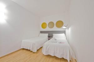 Posteľ alebo postele v izbe v ubytovaní Aparthotel Atenea Valles