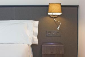 Posteľ alebo postele v izbe v ubytovaní Aparthotel Atenea Valles