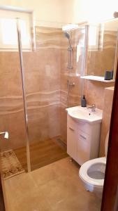 Koupelna v ubytování Apartmani Bambolina i Zala