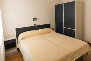 Voodi või voodid majutusasutuse Hotel Sabrina toas