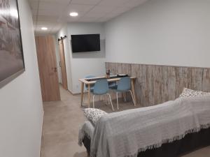 TV a/nebo společenská místnost v ubytování Cal Ribero