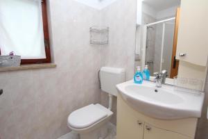Kúpeľňa v ubytovaní Apartment Amabile