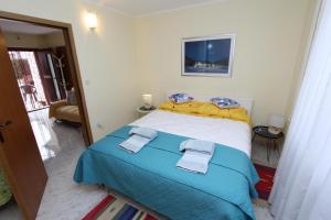 Posteľ alebo postele v izbe v ubytovaní Apartment Amabile