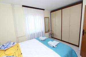 Posteľ alebo postele v izbe v ubytovaní Apartment Amabile