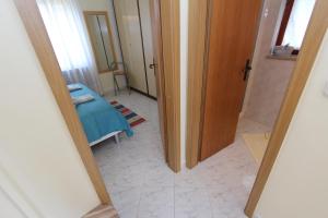 Posteľ alebo postele v izbe v ubytovaní Apartment Amabile