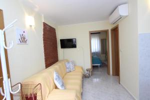 Televízia a/alebo spoločenská miestnosť v ubytovaní Apartment Amabile