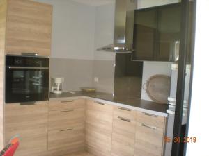 Η κουζίνα ή μικρή κουζίνα στο Gite de Grandcamp Maisy +12 φωτογραφίες