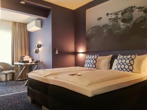 Postel nebo postele na pokoji v ubytování Top Hotel Krämer
