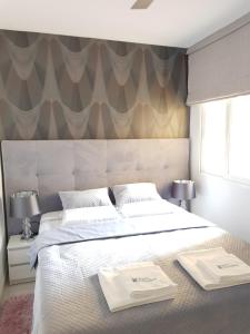 Posteľ alebo postele v izbe v ubytovaní Apartamento Elizabeth