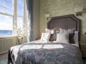 Katil atau katil-katil dalam bilik di Eccles Hotel and Spa