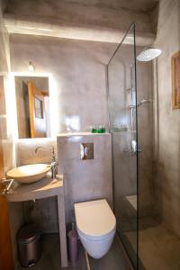 A bathroom at Stelios Rooms