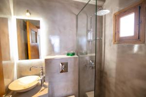 A bathroom at Stelios Rooms