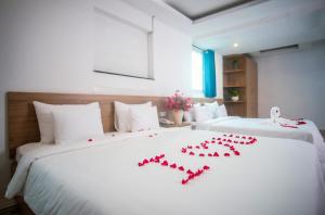 Postel nebo postele na pokoji v ubytování H79 HOTEL