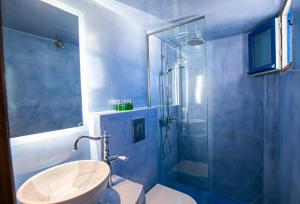 A bathroom at Stelios Rooms