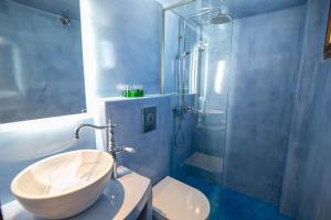 A bathroom at Stelios Rooms