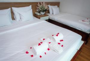 Postel nebo postele na pokoji v ubytování H79 HOTEL