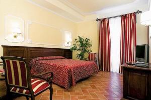 TV a/nebo společenská místnost v ubytování Hotel California