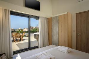 Postel nebo postele na pokoji v ubytování Sun Ray Beach Life Villa + 31 fotografií