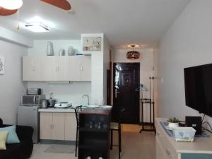 Eldhús eða eldhúskrókur á Mak'z Condo Place