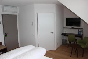 TV o dispositivi per l'intrattenimento presso Seehotel Delphin