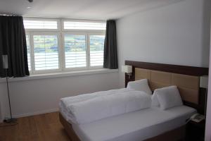 Letto o letti in una camera di Seehotel Delphin