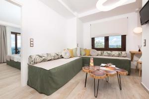 Кровать или кровати в номере Hotel Villa Natassa