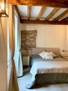 Ένα ή περισσότερα κρεβάτια σε δωμάτιο στο Casa La Margherita