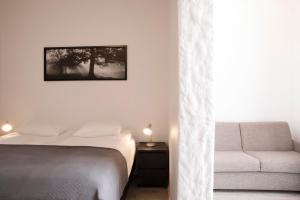 Postel nebo postele na pokoji v ubytování Fosshotel Rauðará