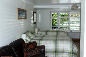Ένα ή περισσότερα κρεβάτια σε δωμάτιο στο Highworth House
