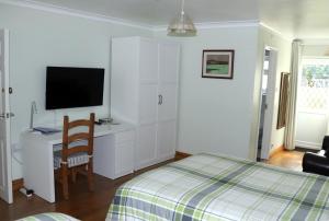 Säng eller sängar i ett rum på Highworth House