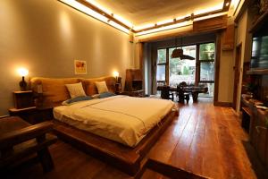 TV a/nebo společenská místnost v ubytování Yunlu Lianxin Guesthouse