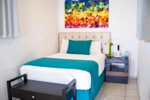 Container Inn Hotel Aeropuerto客房内的一张或多张床位