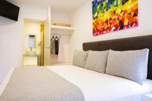 Container Inn Hotel Aeropuerto客房内的一张或多张床位