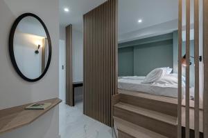 Posteľ alebo postele v izbe v ubytovaní Philosofia Athens Suites