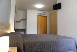 Postel nebo postele na pokoji v ubytování Bed Ponente