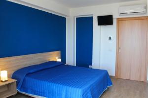 Postel nebo postele na pokoji v ubytování Bed Ponente