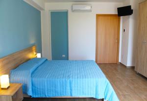 Postel nebo postele na pokoji v ubytování Bed Ponente