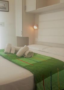 A bed or beds in a room at Hotel Imperiale