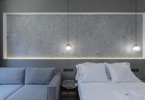 Posteľ alebo postele v izbe v ubytovaní Philosofia Athens Suites