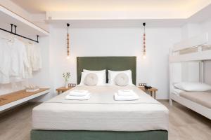 Кровать или кровати в номере Hotel Villa Natassa