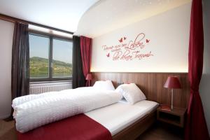 Letto o letti in una camera di Seehotel Delphin