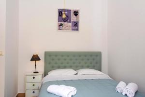 Postel nebo postele na pokoji v ubytování ROSE HOUSE