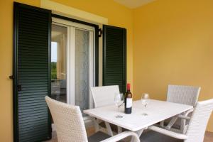 Fotografie z fotogalerie ubytování ROSE HOUSE v destinaci Kompítsion