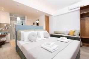 Кровать или кровати в номере Hotel Villa Natassa