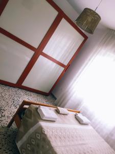 Postel nebo postele na pokoji v ubytování B&B dell'Amicizia