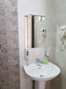 Ванная комната в Apartments Baqari Inn