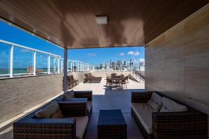 Uma área de estar em Tambau Beach Hotel