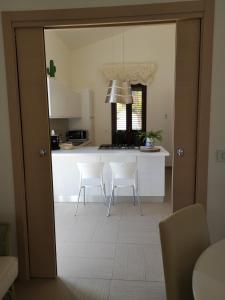 Kuchyň nebo kuchyňský kout v ubytování Villa Residenza Medea