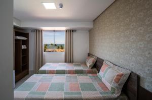 Cama ou camas em um quarto em Tambau Beach Hotel mais 32 fotos